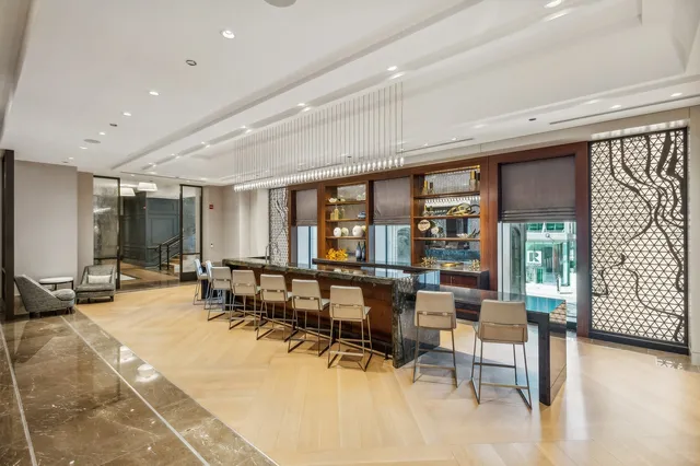 a bedroom with bed and balcony