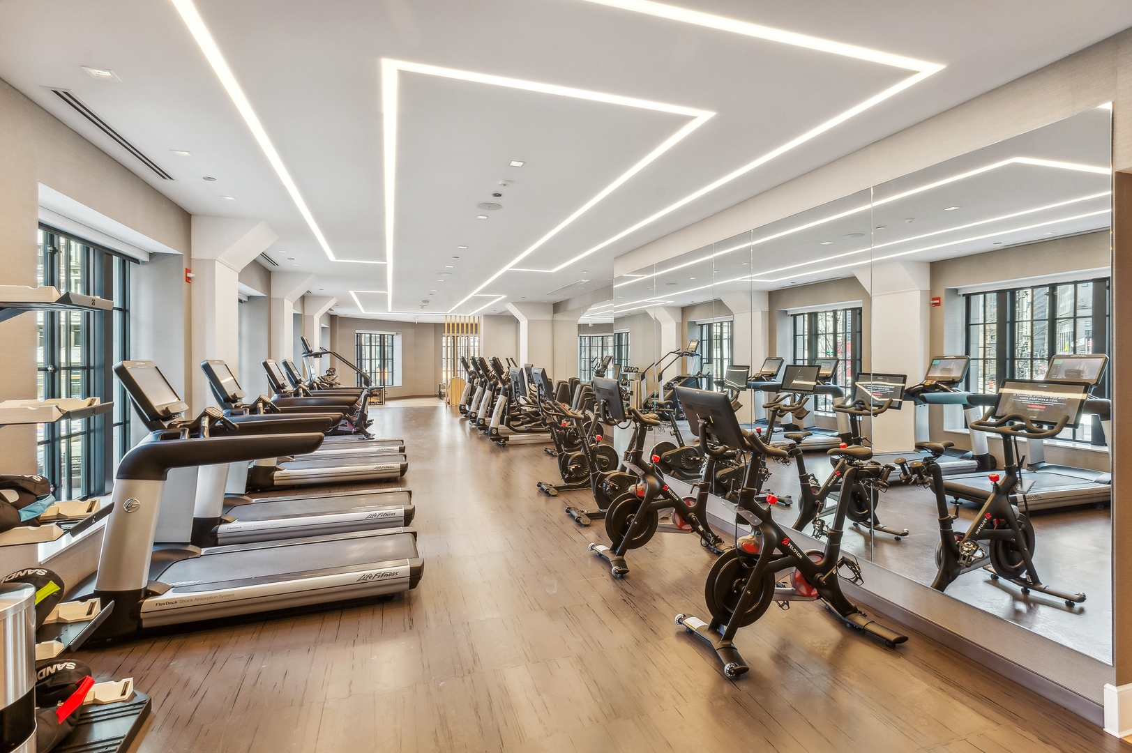 435 North Michigan Avenue, Unit 1112 Chicago, IL 60611 - Photo 65 of 70 a living room with lots of wooden furniture and a ceiling fan