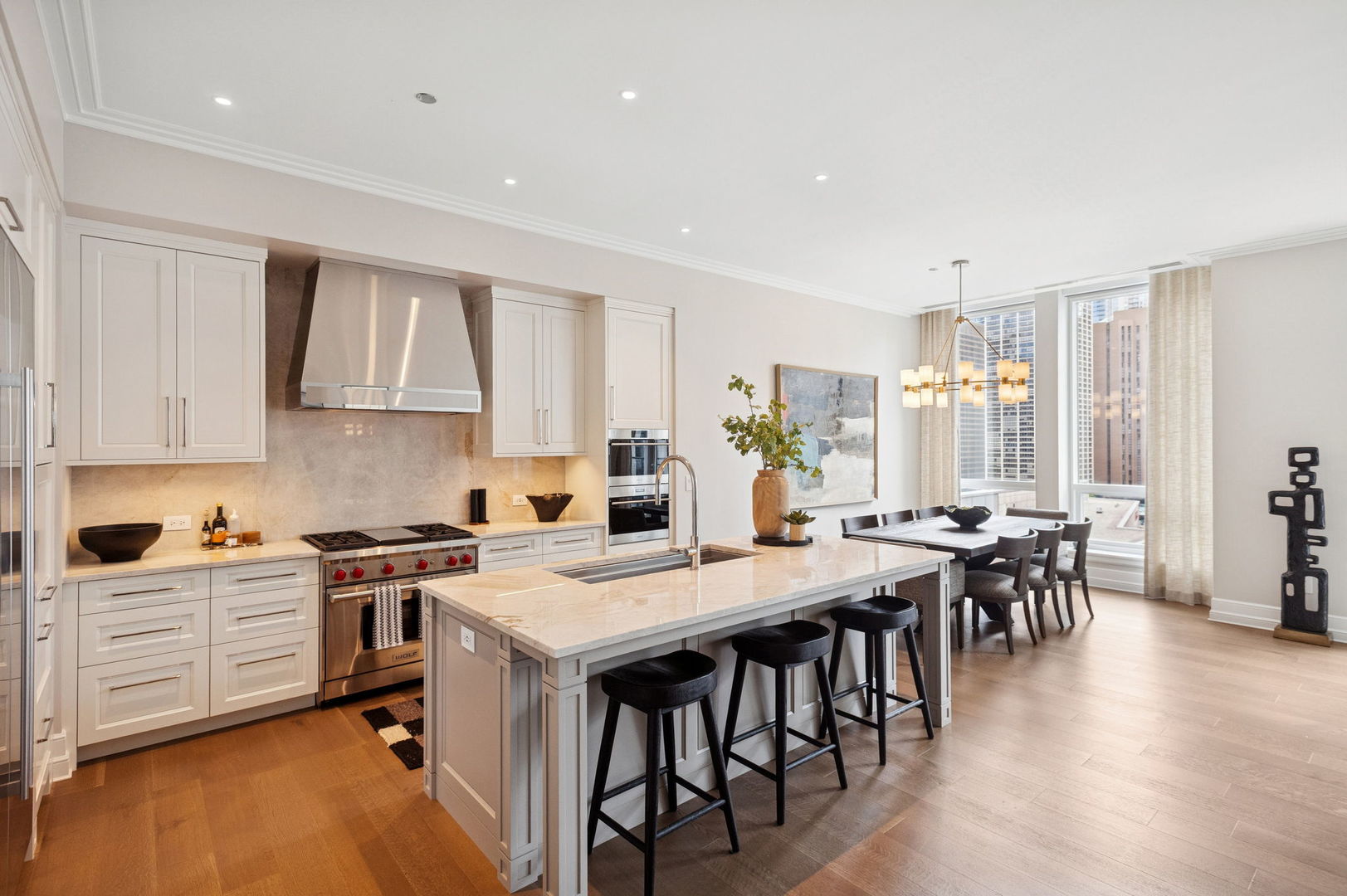 435 North Michigan Avenue, Unit 1112 Chicago, IL 60611 - Photo 8 of 70 a kitchen that has a table and chairs in it