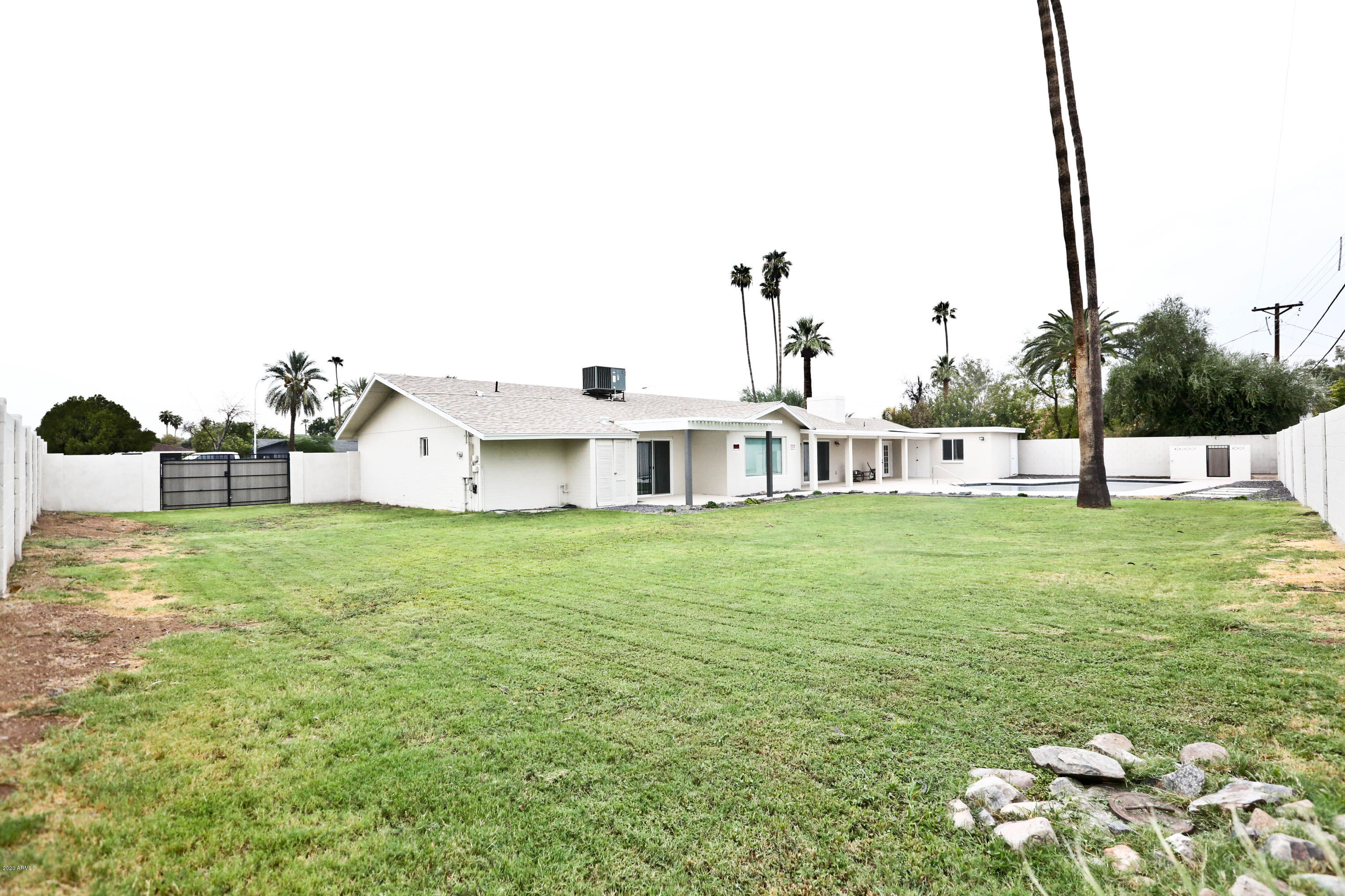 3414 East Camelback Road Phoenix, AZ 85018 - Photo 52 of 81 a view of a house with a big yard
