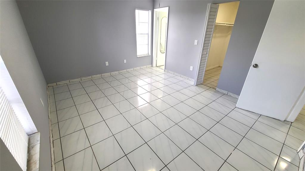 2800 Northwest 56th Avenue, Unit A305 Lauderhill, FL 33313 - Photo 12 of 15 an empty room with windows