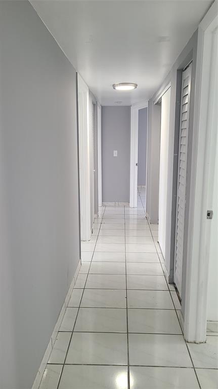 2800 Northwest 56th Avenue, Unit A305 Lauderhill, FL 33313 - Photo 8 of 15 a view of livingroom with hallway