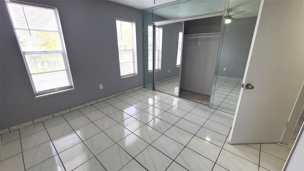 2800 Northwest 56th Avenue, Unit A305 Lauderhill, FL 33313 - Photo 9 of 15 a view of an empty room and window