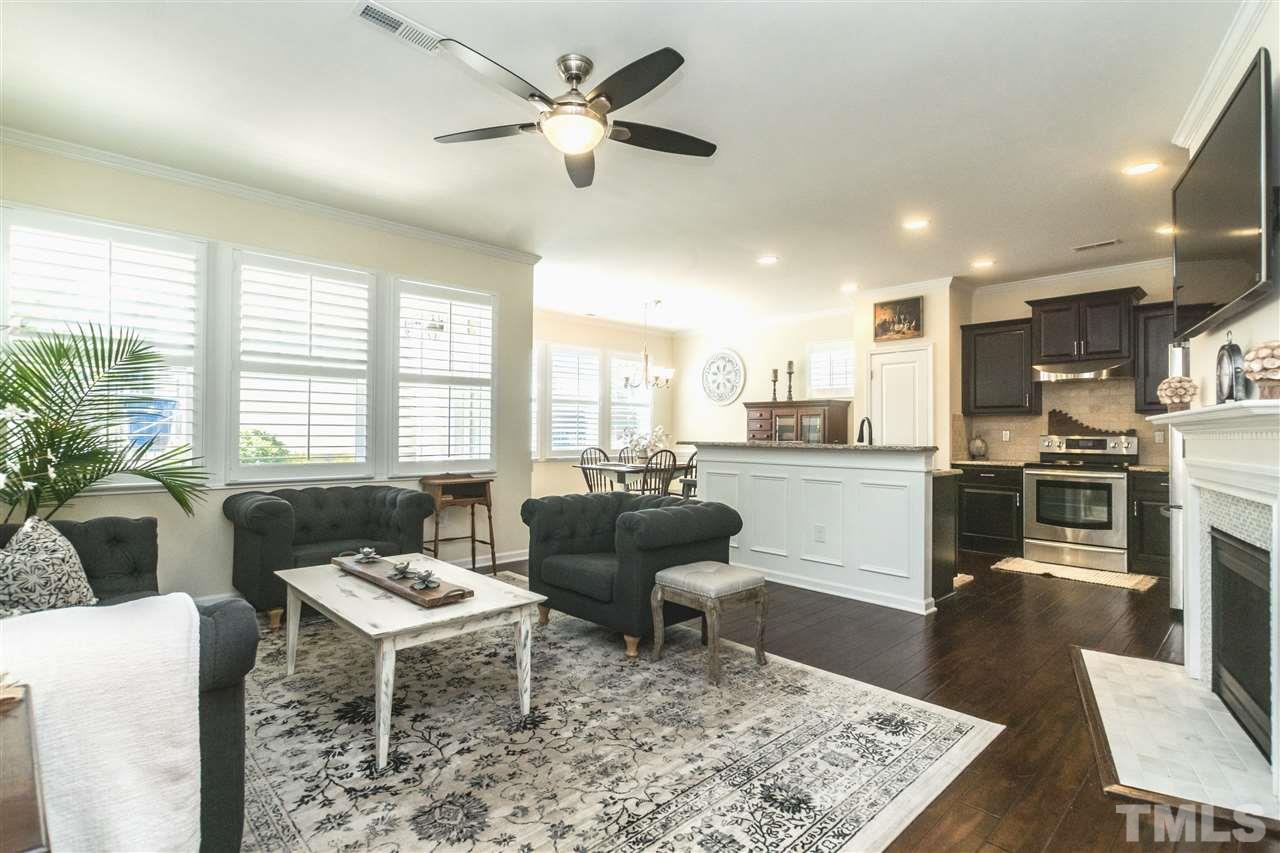 1407 Rodessa Run Raleigh, NC 27607 - Photo 3 of 30 a living room with furniture and a table