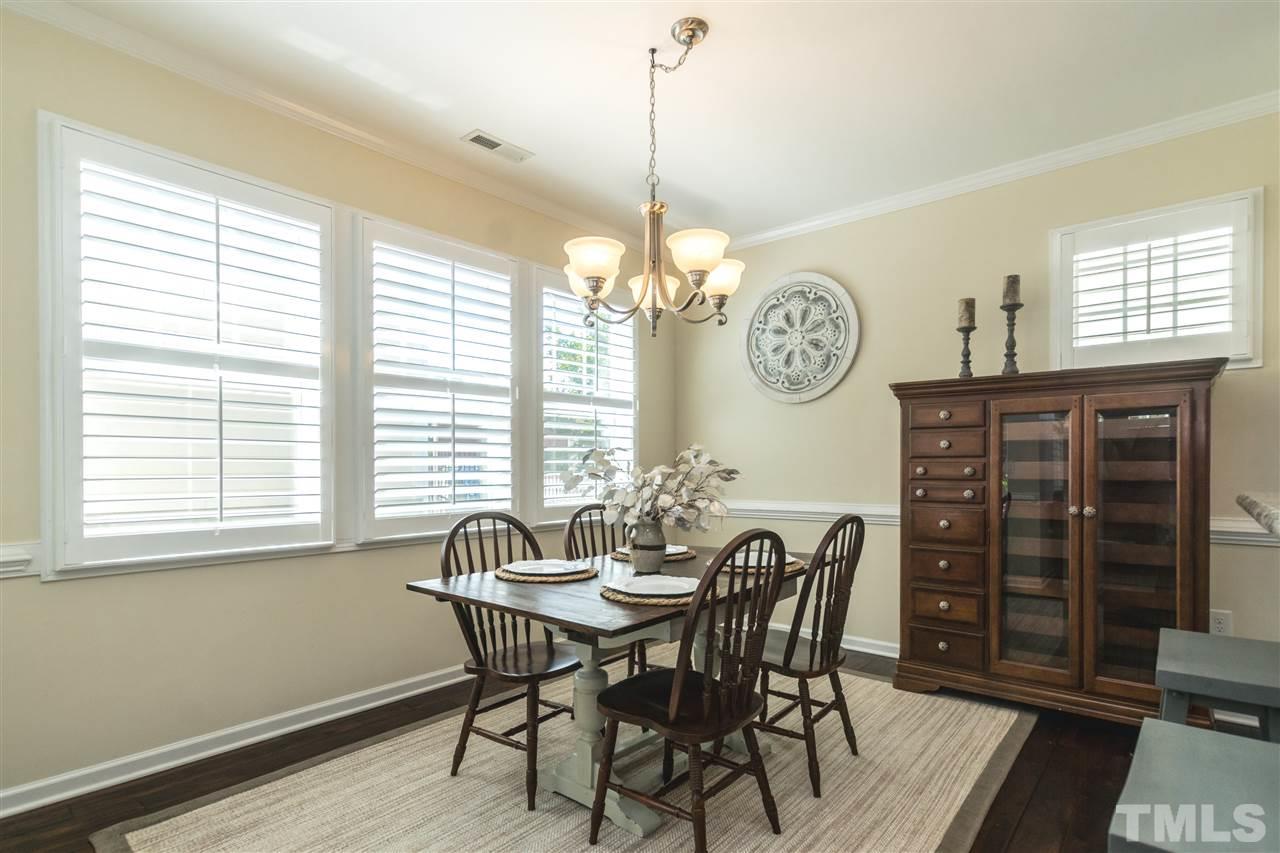 1407 Rodessa Run Raleigh, NC 27607 - Photo 9 of 30 a dining room with furniture and window
