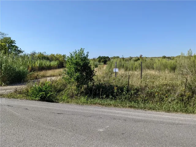 a view of a lake with a mountain in the background