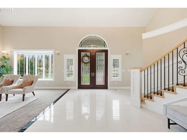 a view of a couches and a fireplace in the room