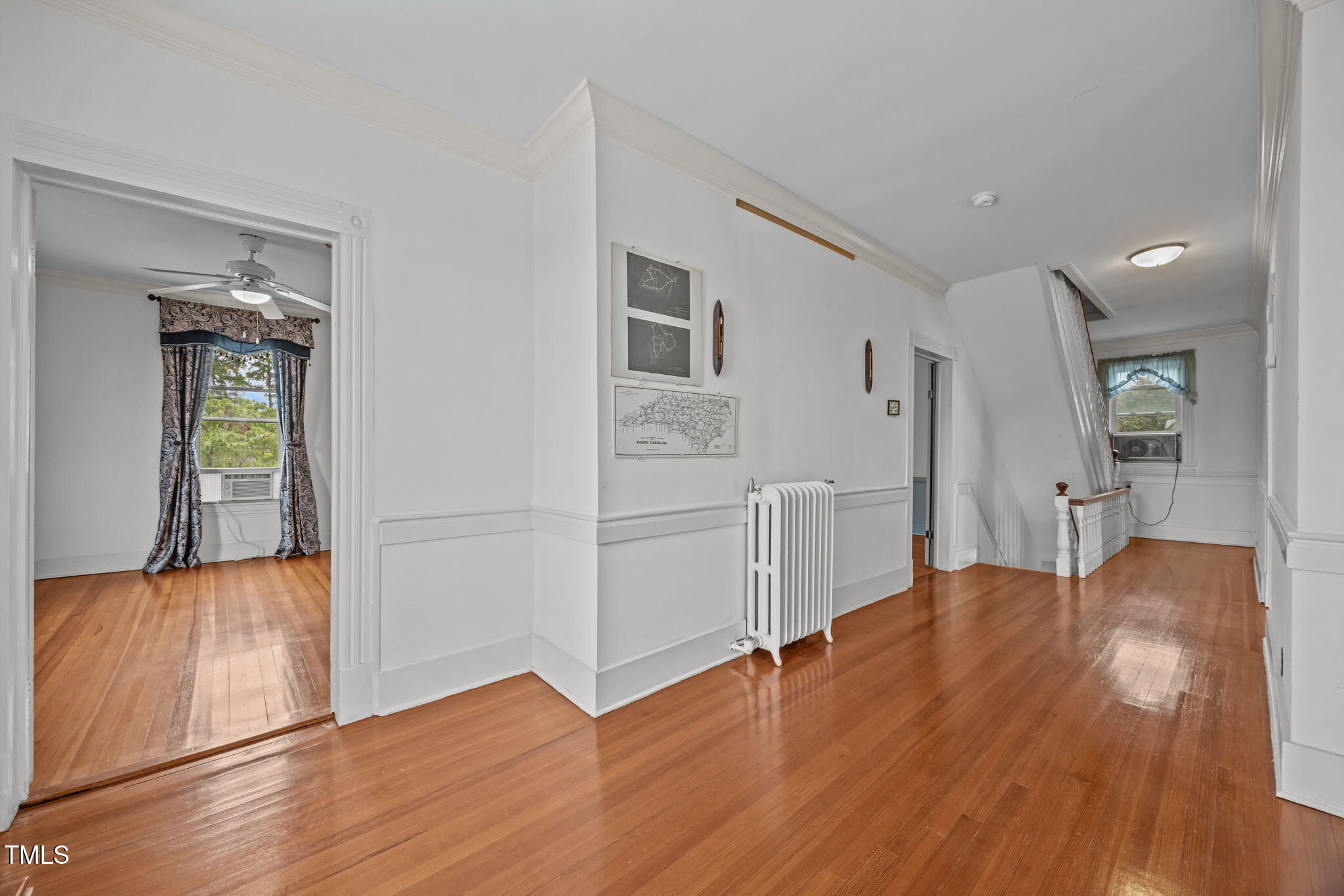 301 East H Street Erwin, NC 28339 - Photo 25 of 56 a view of a kitchen with wooden floor and a kitchen