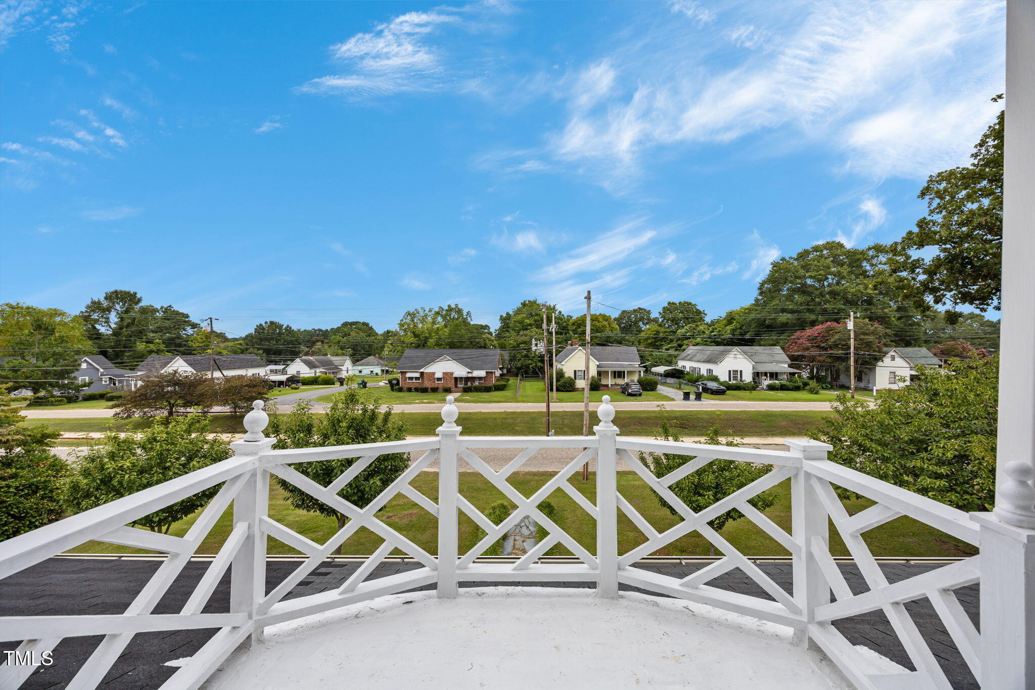 301 East H Street Erwin, NC 28339 - Photo 27 of 56 a view of a chairs and table on the terrace