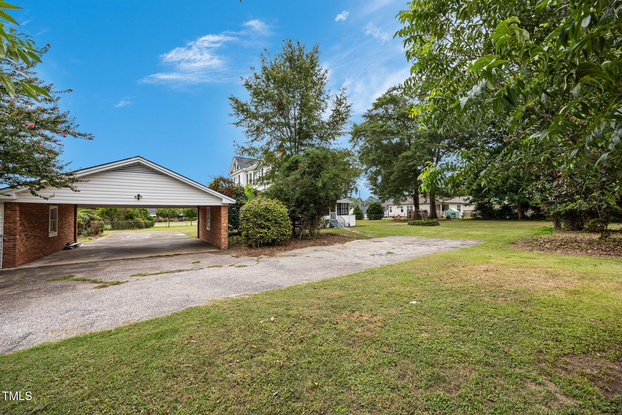 301 East H Street Erwin, NC 28339 - Photo 52 of 56 a view of a house with yard and tree s
