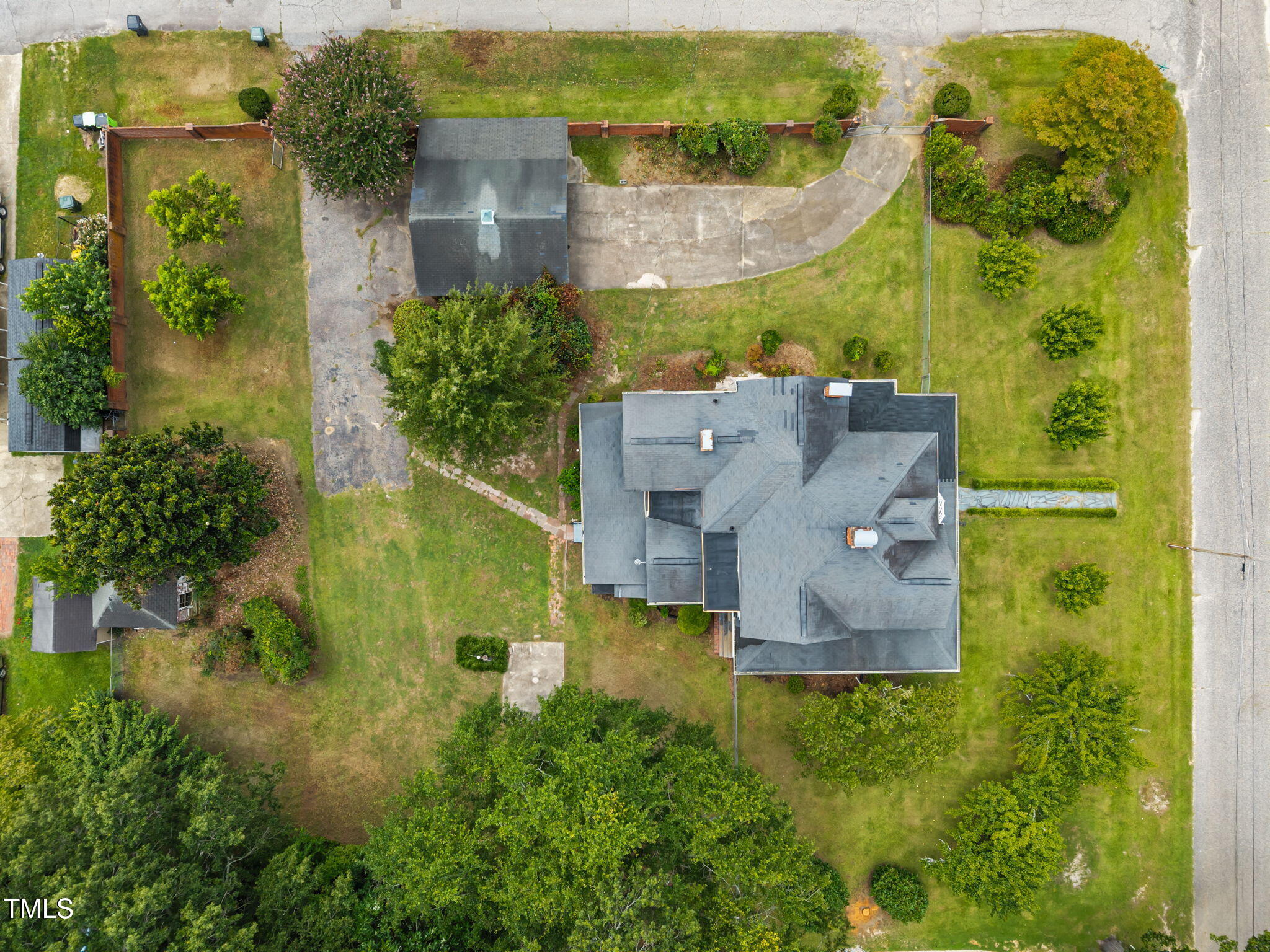 301 East H Street Erwin, NC 28339 - Photo 53 of 56 an aerial view of residential houses with outdoor space and swimming pool