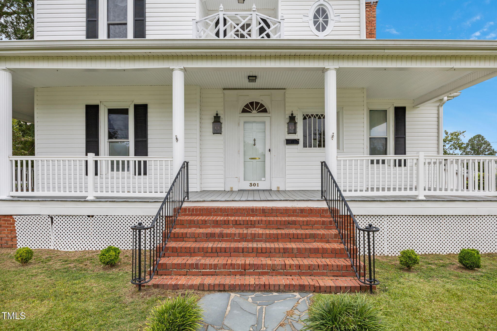 301 East H Street Erwin, NC 28339 - Photo 57 of 58 a front view of a house with a swimming pool