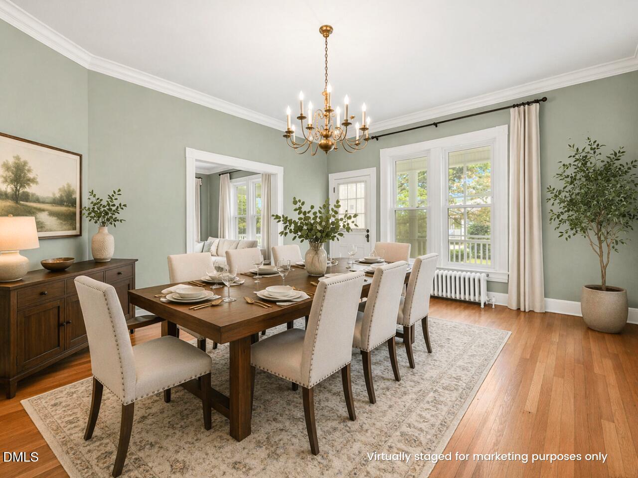 301 East H Street Erwin, NC 28339 - Photo 7 of 56 a view of a dining room with furniture window and wooden floor