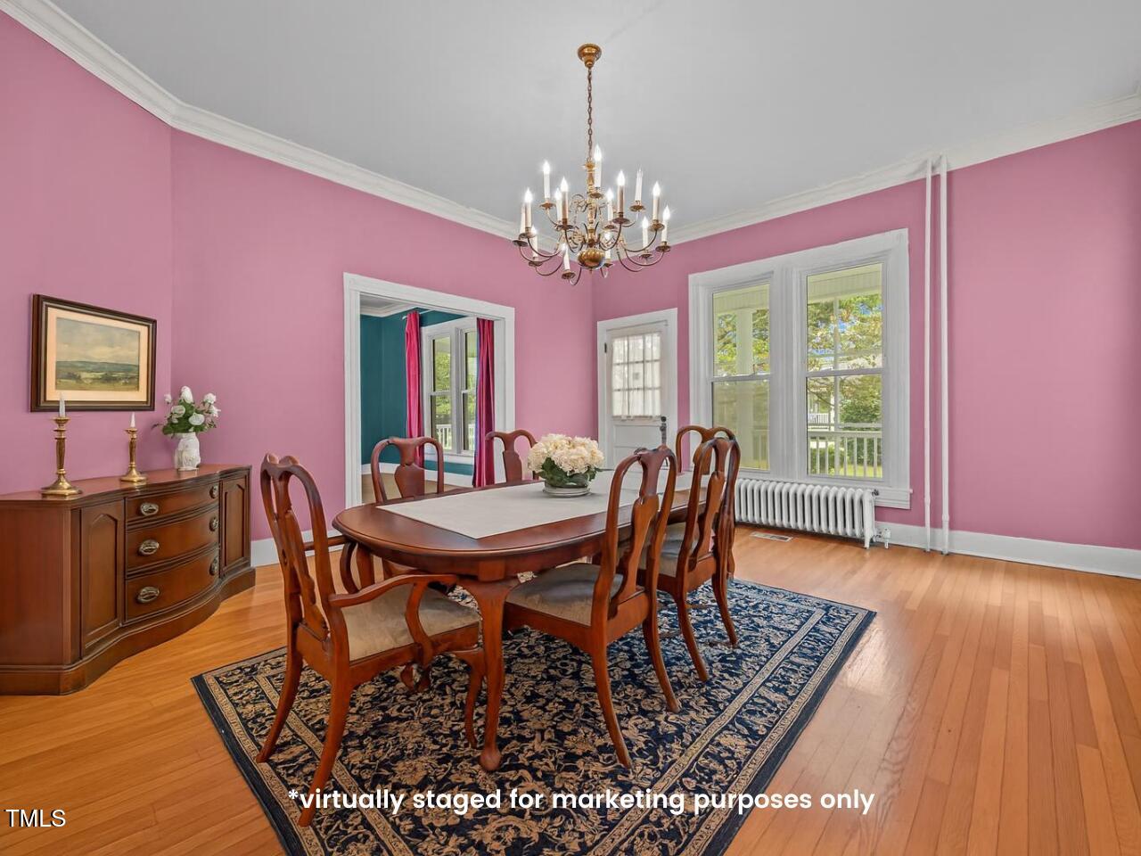 301 East H Street Erwin, NC 28339 - Photo 8 of 58 a view of a dining room with furniture window and wooden floor
