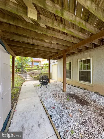 a view of entryway with a front door