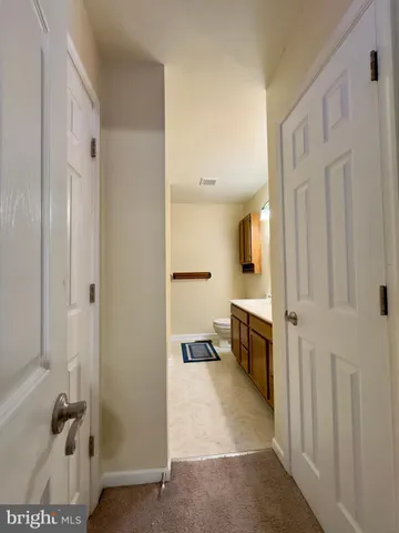 a bathroom with a tub and a sink