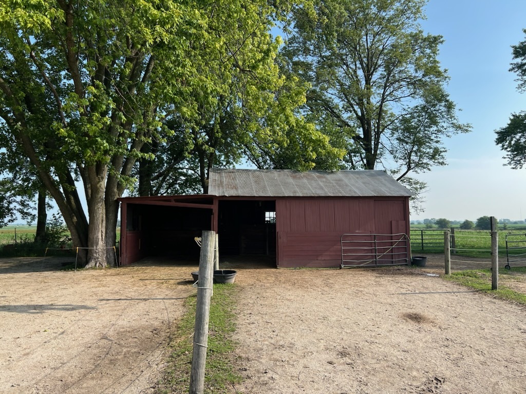 3851 Holt Road Minooka, IL 60447 - Photo 54 of 59 a front view of a house with a yard