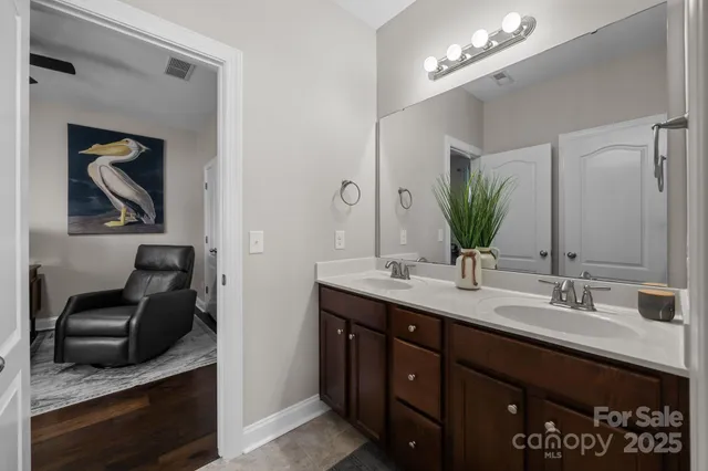 a bathroom with a toilet a sink and bathtub