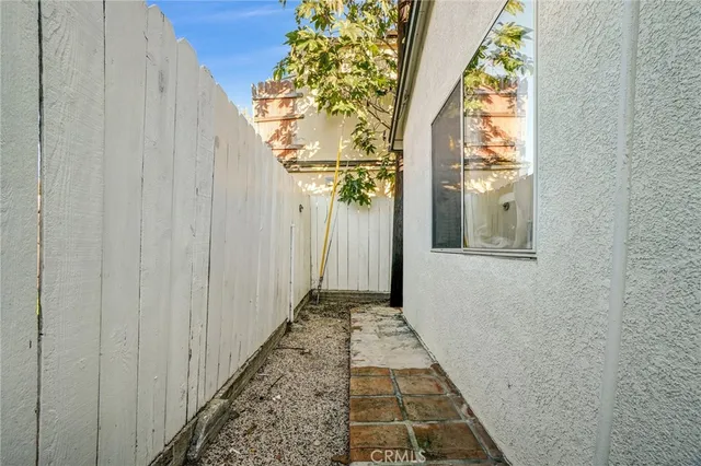 a bedroom with a bed furniture and a window