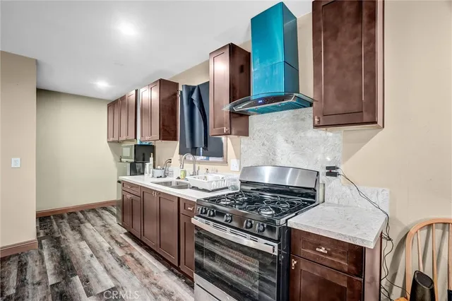 a view of a kitchen with washer and dryer