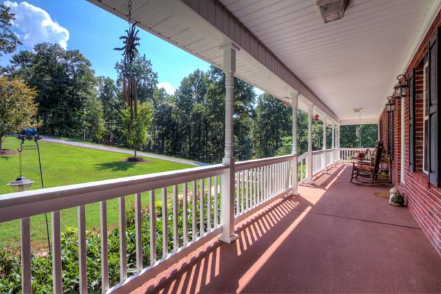 4173 Chestnut Ridge Road Santa Fe, TN 38482 - Photo 3 of 20 Rocking Chair front porch