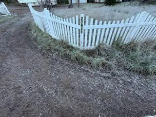a view of a fence yard