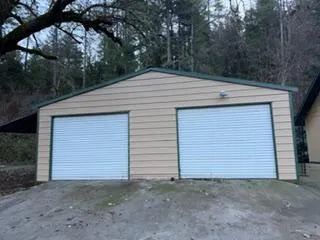 a view of a house with a garage