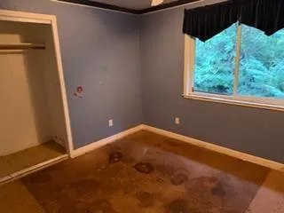 a view of a big room with window