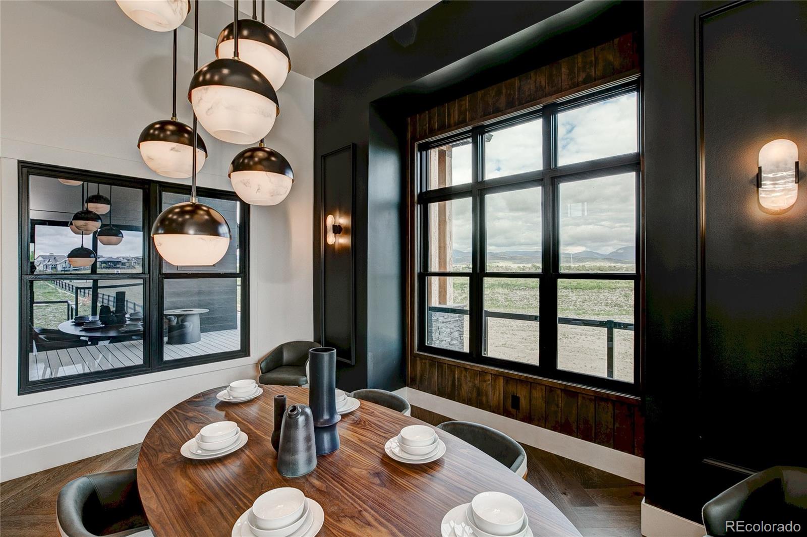 2531 Southwind Road Berthoud, CO 80513 - Photo 11 of 33 a table with chairs and a table in it