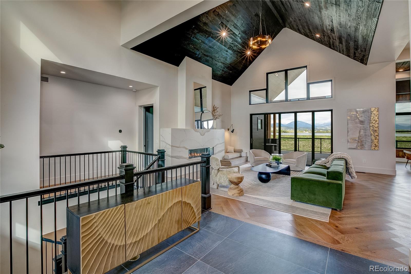 2531 Southwind Road Berthoud, CO 80513 - Photo 2 of 33 a building outdoor space with patio furniture and potted plants