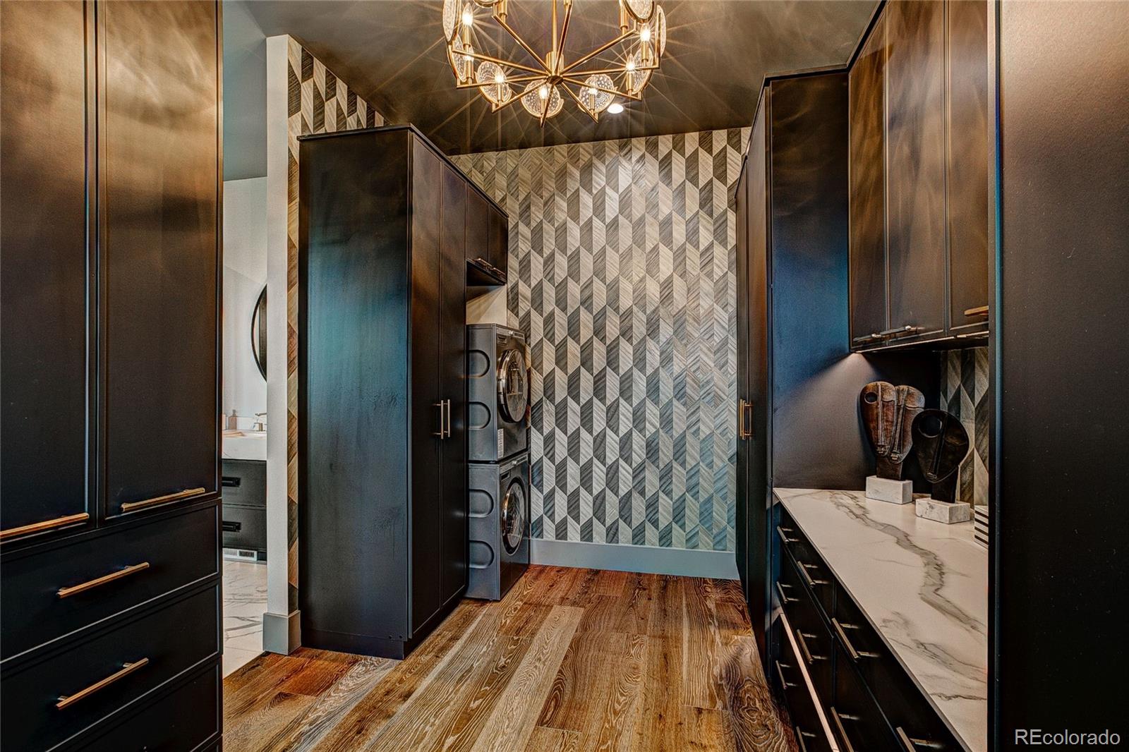 2531 Southwind Road Berthoud, CO 80513 - Photo 22 of 33 a bed room with a bed and a walk in closet