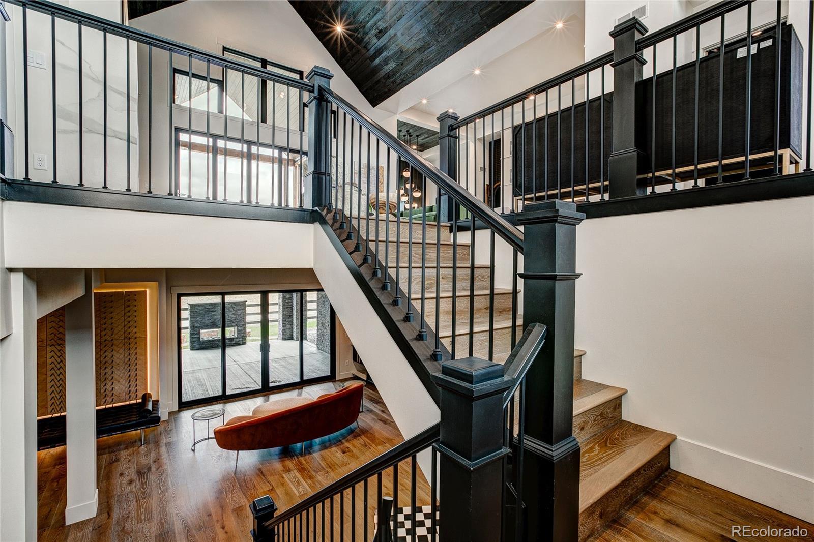 2531 Southwind Road Berthoud, CO 80513 - Photo 23 of 33 a view of entryway with wooden floor and front door
