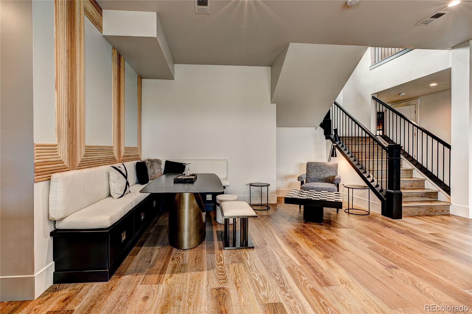2531 Southwind Road Berthoud, CO 80513 - Photo 24 of 33 a living room with furniture and a wooden floor
