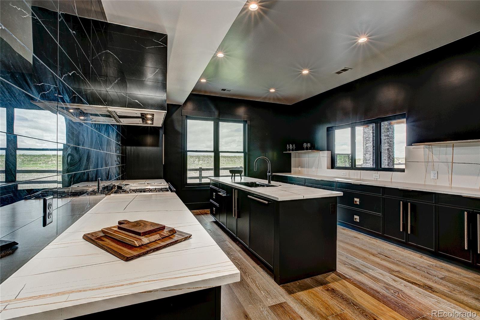 2531 Southwind Road Berthoud, CO 80513 - Photo 26 of 33 a kitchen with lots of counter top space