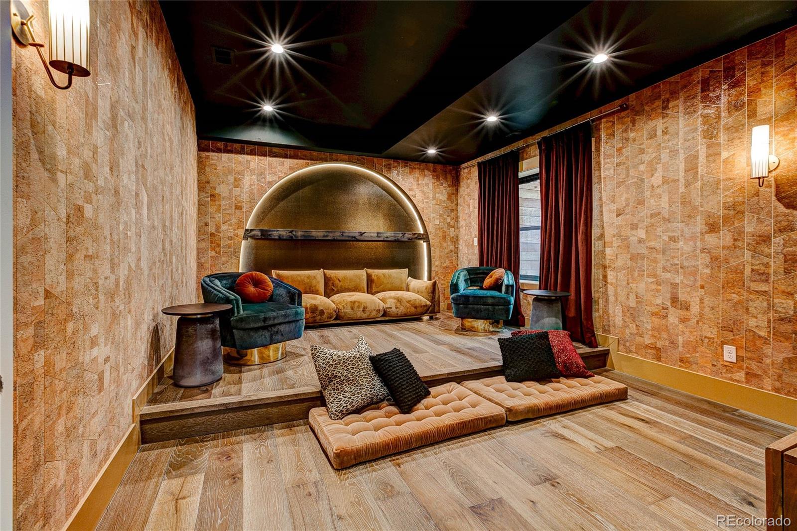 2531 Southwind Road Berthoud, CO 80513 - Photo 27 of 33 a living room with furniture and a wooden floor