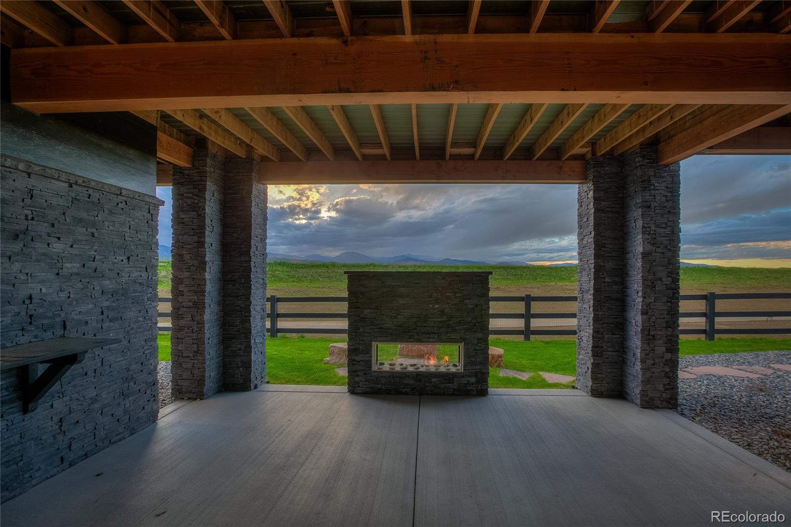 2531 Southwind Road Berthoud, CO 80513 - Photo 30 of 33 a view of a room with a fireplace and a window