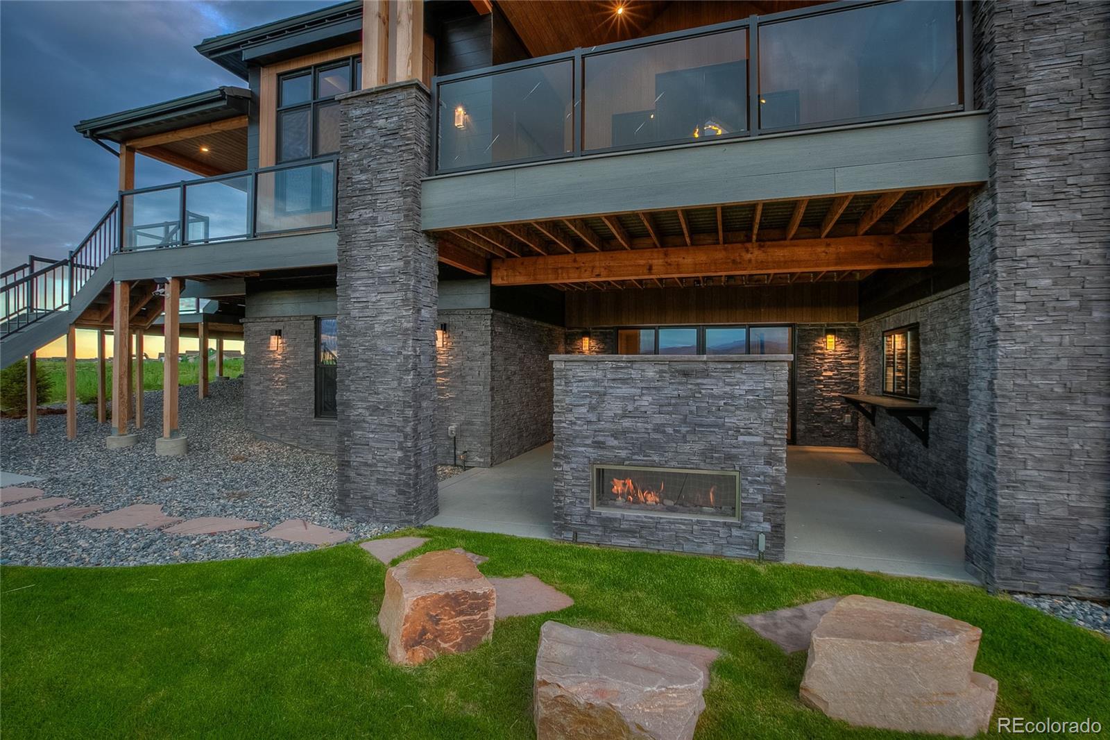 2531 Southwind Road Berthoud, CO 80513 - Photo 31 of 33 a front view of a house with a garden