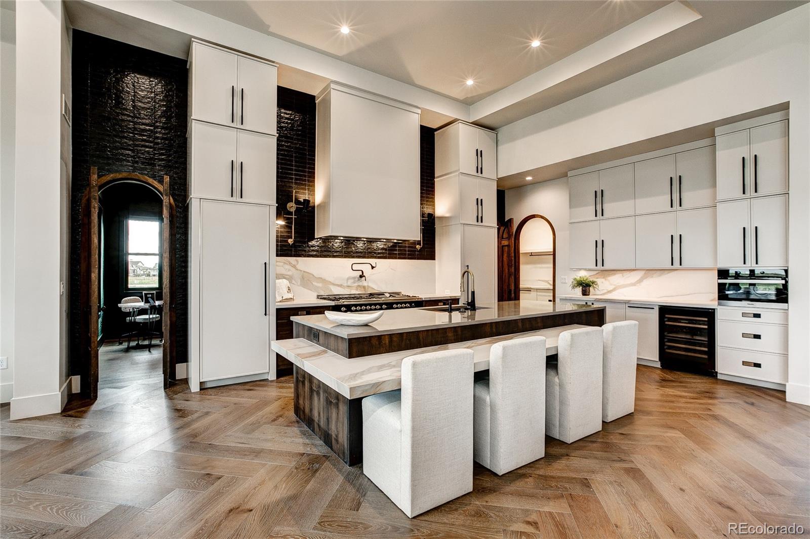 2531 Southwind Road Berthoud, CO 80513 - Photo 5 of 33 a kitchen with stainless steel appliances granite countertop a stove and a refrigerator
