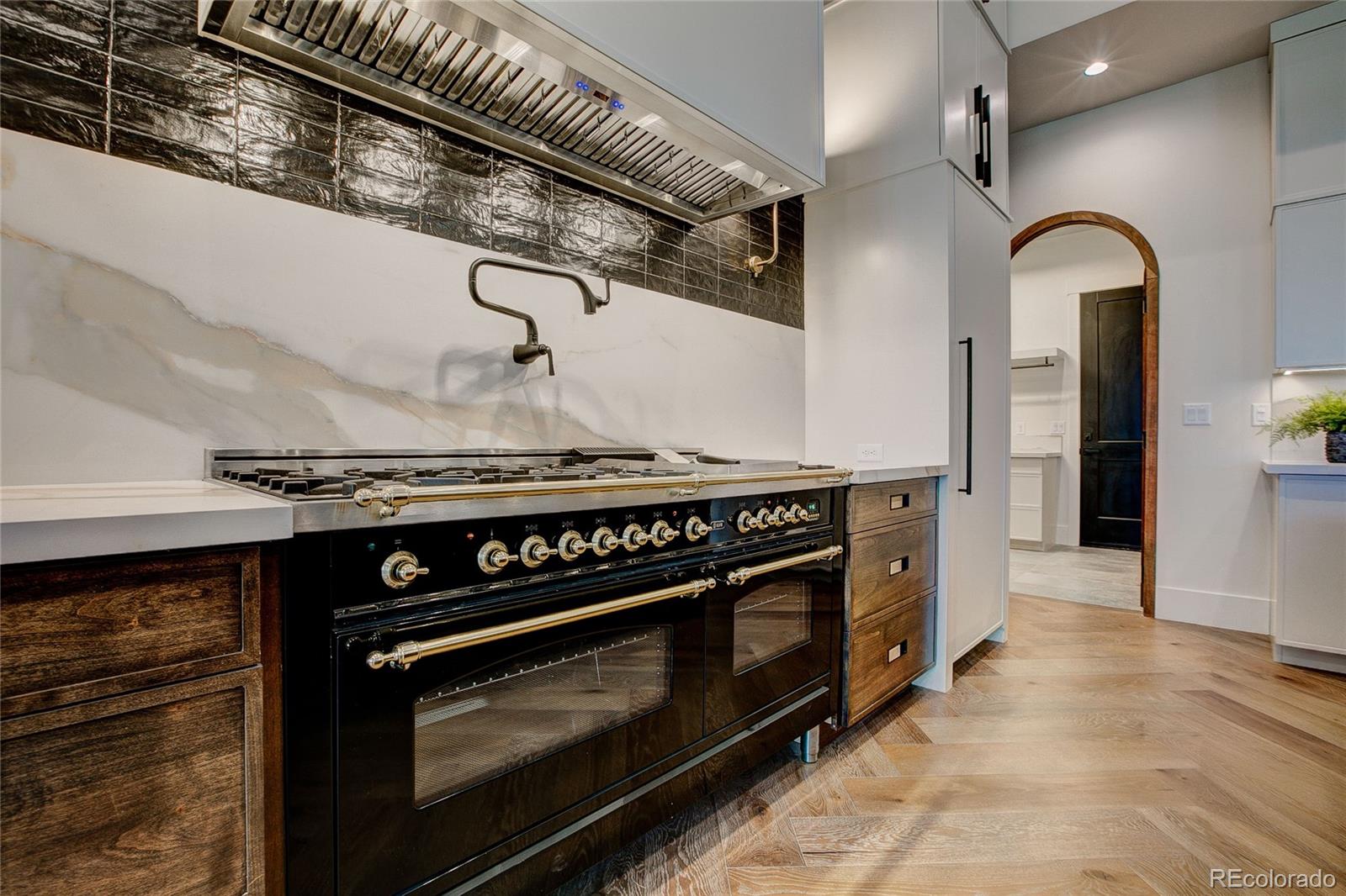 2531 Southwind Road Berthoud, CO 80513 - Photo 7 of 33 a stove top oven sitting inside of a kitchen