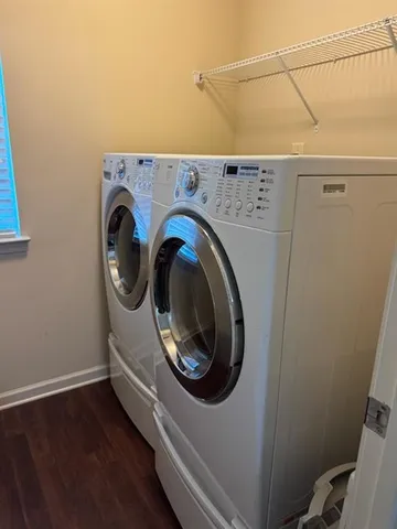 a utility room with dryer and washer