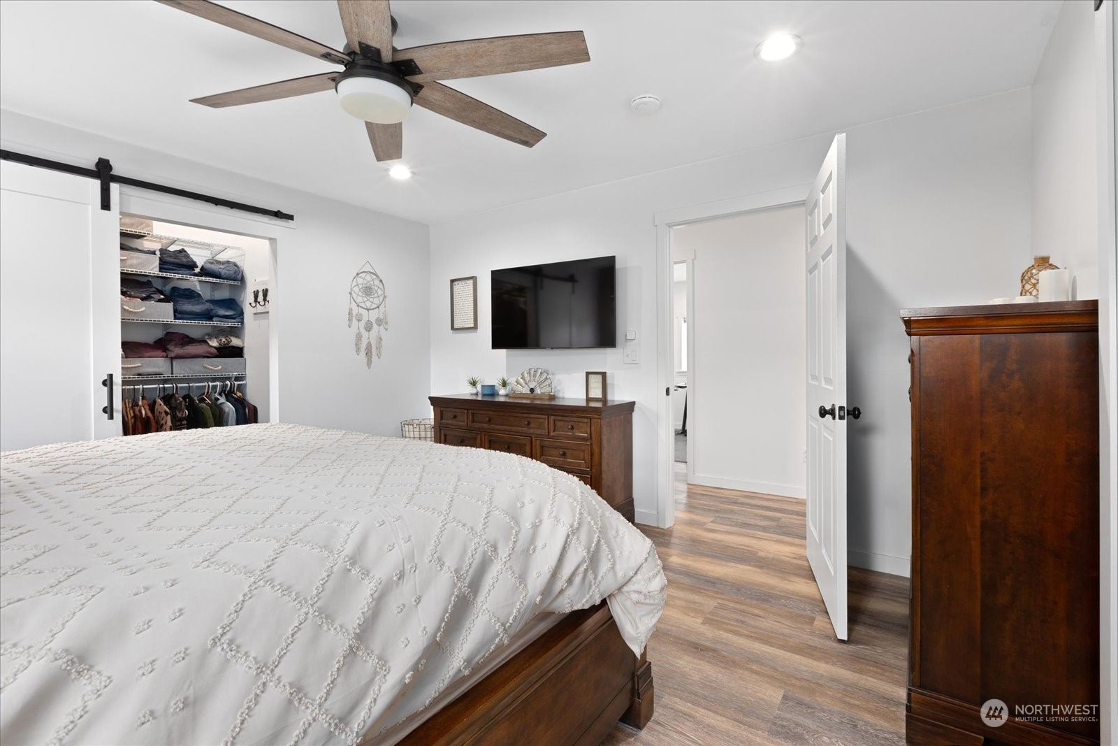 35124 Mann Road Sultan, WA 98294 - Photo 20 of 40 a bedroom with a bed and a flat screen tv