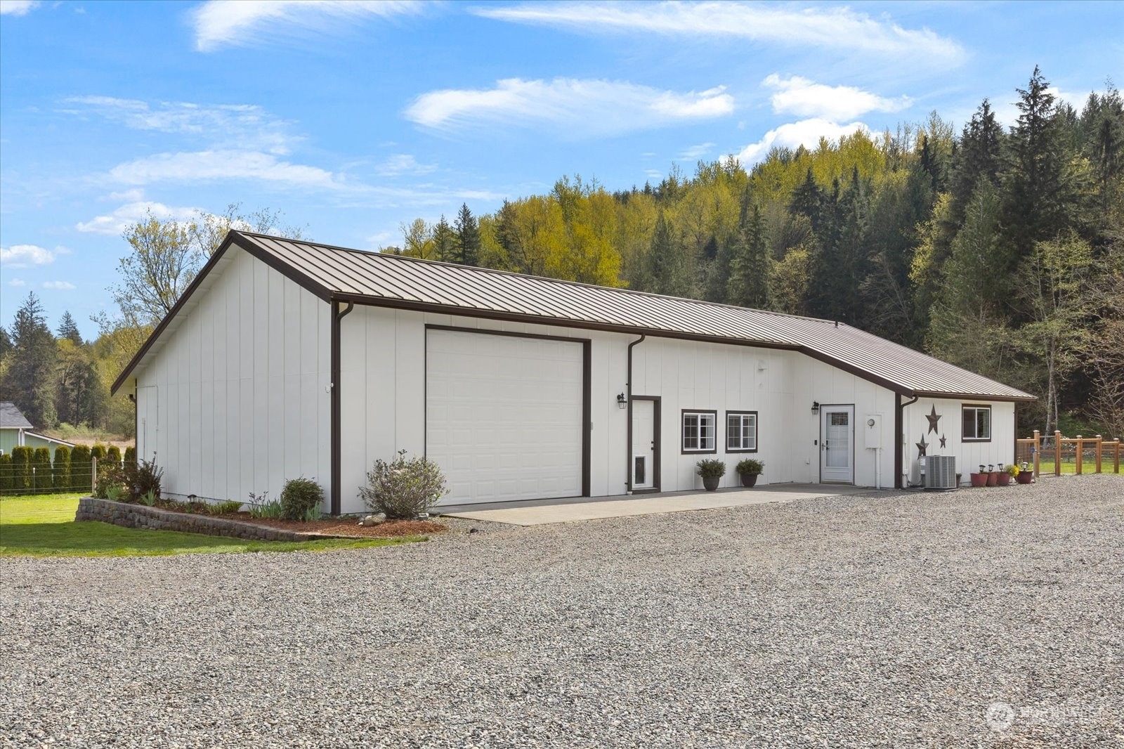 35124 Mann Road Sultan, WA 98294 - Photo 24 of 40 a view of a house with a yard