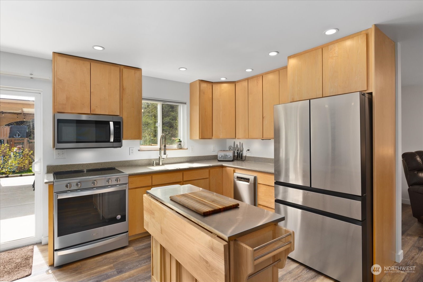 35124 Mann Road Sultan, WA 98294 - Photo 8 of 40 a kitchen with a refrigerator sink and microwave
