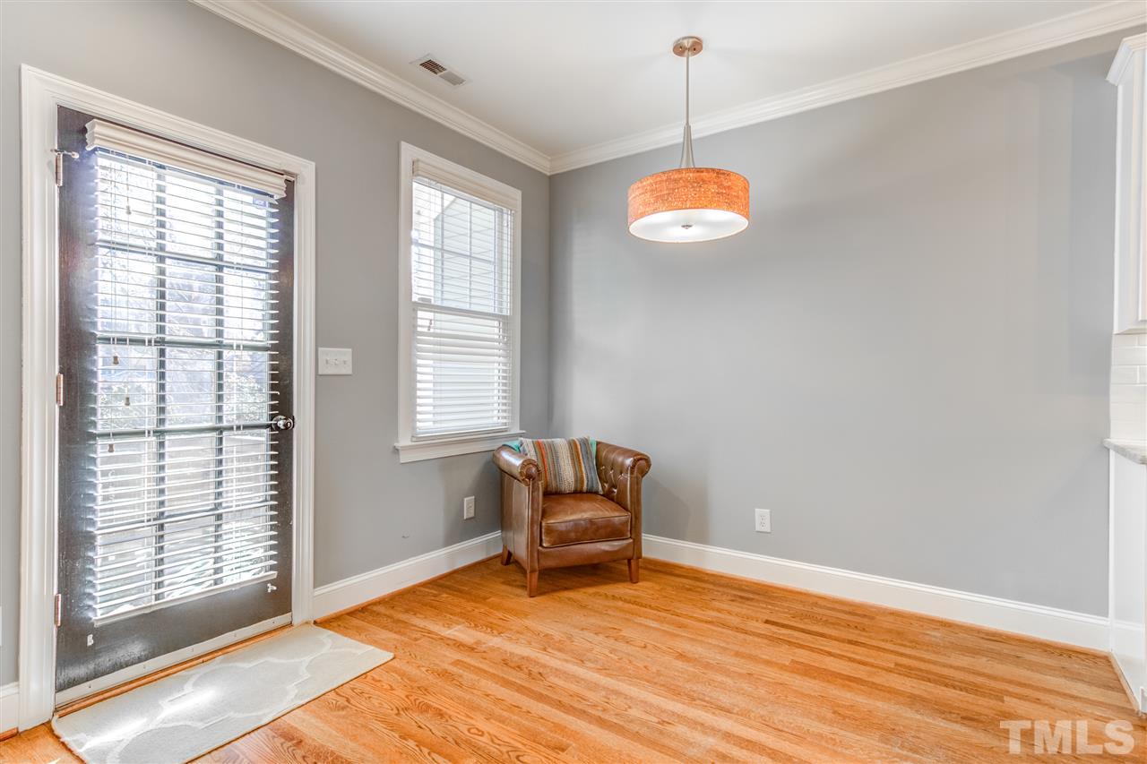 816 Cotton Exchange Court Raleigh, NC 27608 - Photo 11 of 25 a living room with furniture and window