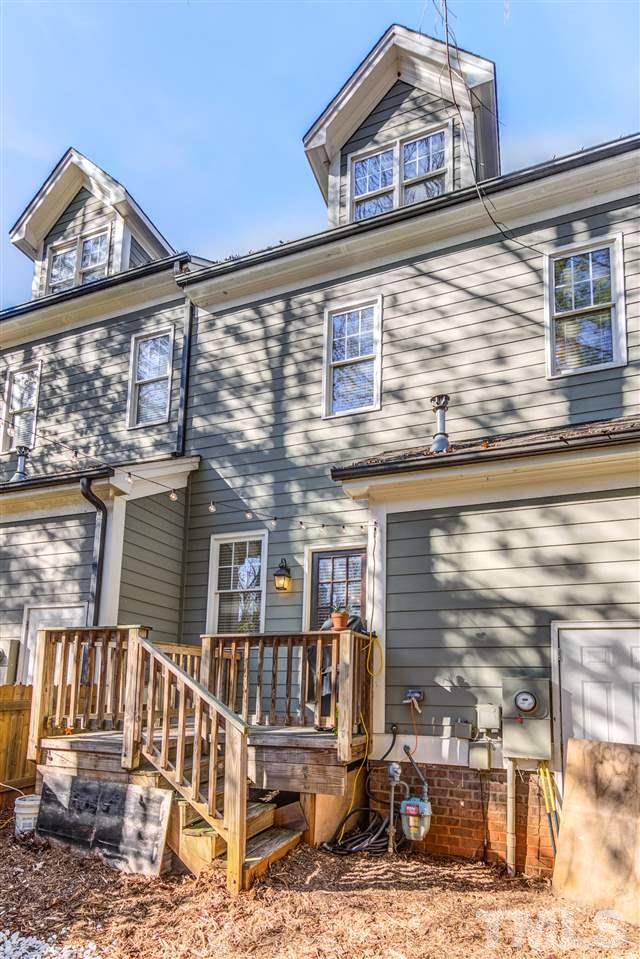816 Cotton Exchange Court Raleigh, NC 27608 - Photo 22 of 25 front view of a house with a balcony