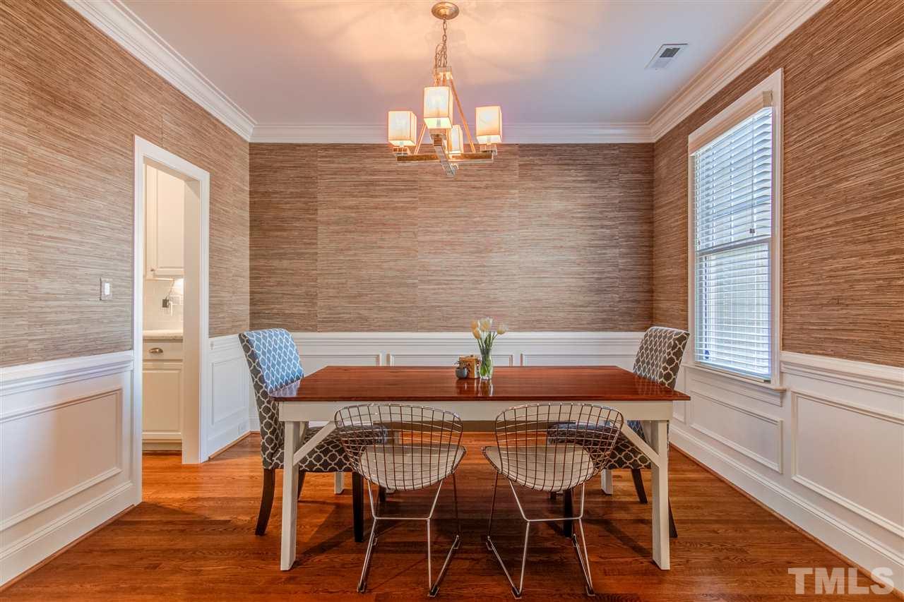 816 Cotton Exchange Court Raleigh, NC 27608 - Photo 4 of 25 a view of a dining room with furniture window and wooden floor