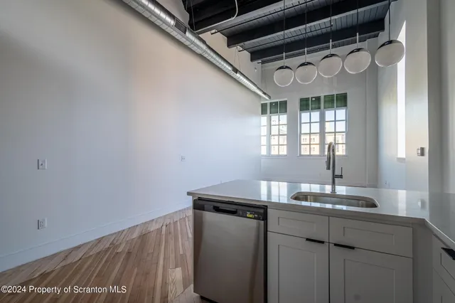 a bathroom with a sink a toilet and a bathtub