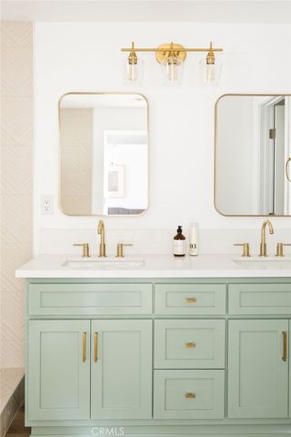 a bathroom with a bathtub and a window