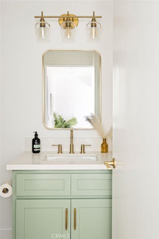 a balcony with wooden floor and outdoor space