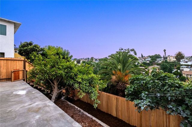 a view of an house with entryway and front of it